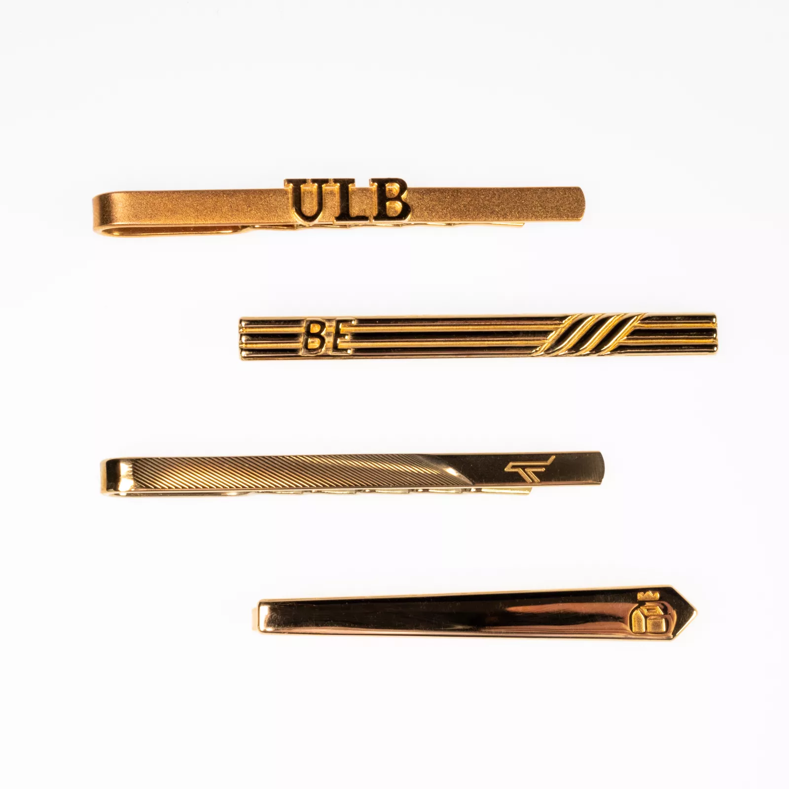 Custom-made gold-plated tie clips with logo